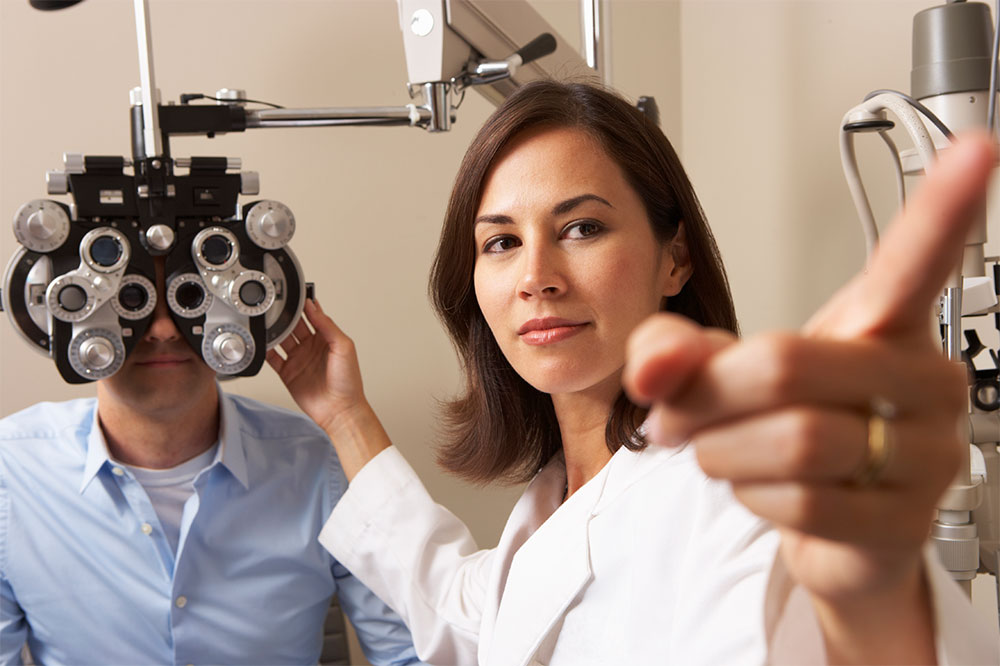 Optometrist pointing