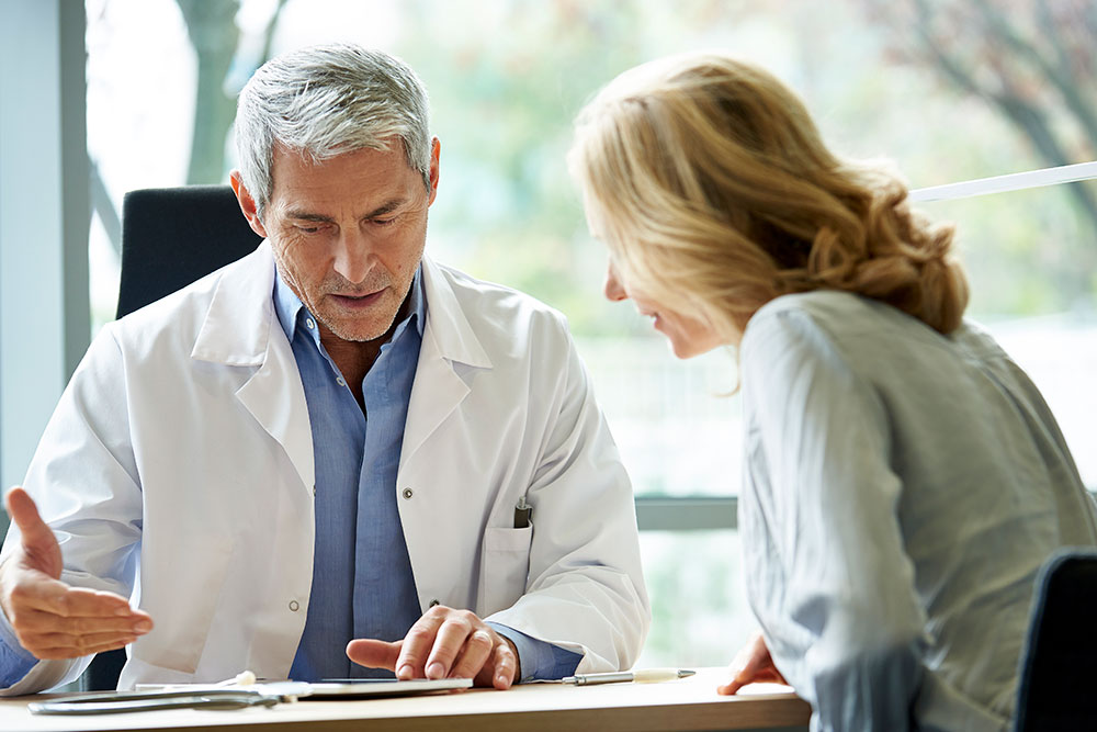 Doctor talking to patient